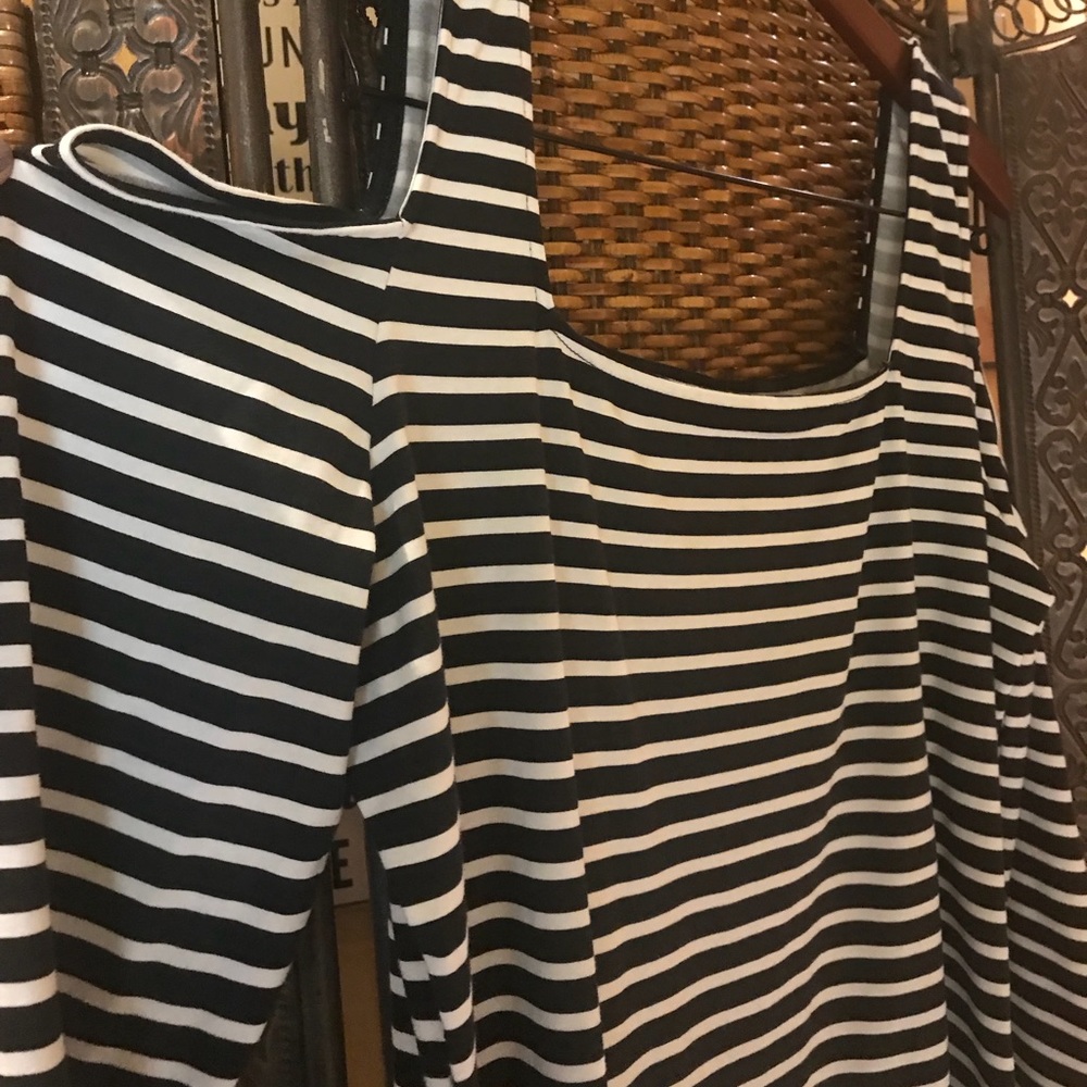 Black and white striped top.
